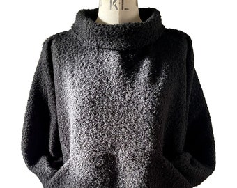 Black funnel neck slouchy Teddy Boucle top with pockets Baylis and knight