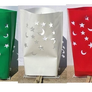 May include: Three decorative metal planters with a star and crescent moon design. The planters are green, white, and red.