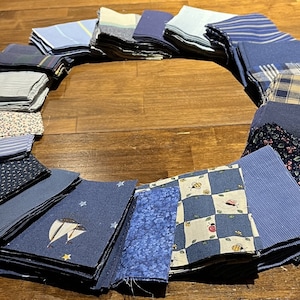 560 Pieces of Blue Cotton Fabric Squares