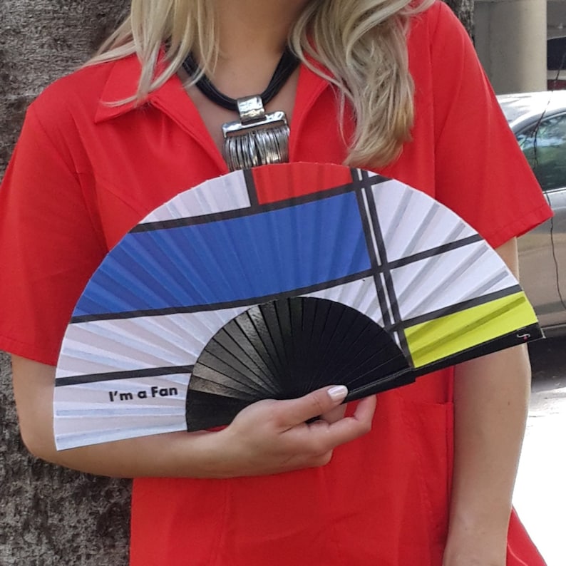 I'M A FAN: Mondrian inspired folding hand fan in bold red, blue, yellow colors with black wood ribs image 1