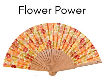 FLOWER POWER: Bright yellow, orange and red 70s hippie retro floral print folding hand fan with natural wood ribs