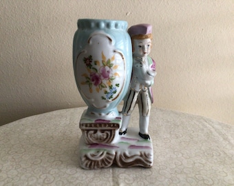 Vintage Colonial Boy Holding a Bird and Vase