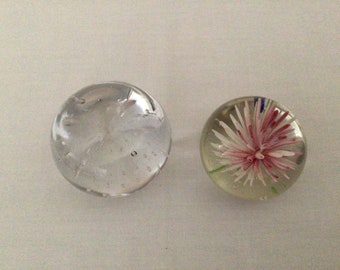 Two Glass Paperweights Glass Controlled Bubble and Pink Abstract Flower