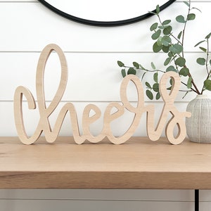 Letrero de madera grande con texto "Cheers" para decorar, independiente, para el hogar, escrito a mano, para Año Nuevo, para fiestas, para celebrar y para bar