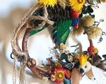 Handmade flying bird wreath with Australian native dried flowers, bush inspired wall art