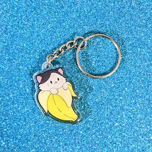 Banana Cat Charm / Clear Acrylic Keychain / Chibi and Kawaii Style / Cutesy Merchandise / Dangle Earrings