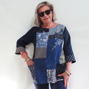 Unique Patchwork Shirt made from  Recycled Kimono fabrics with   Pure Linen and Cotton prints has  Boat neck and Three Quarter Sleeves.