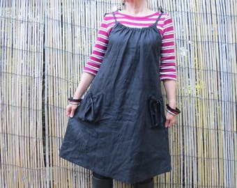 Loose Linen Pinafore  with drawstring neckline and pockets is available in Black, White and  other colours- great to wear in all seasons.