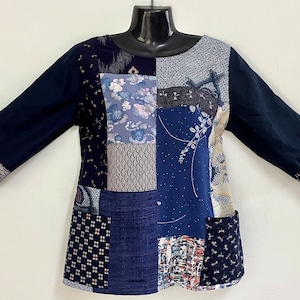 Unique Patchwork Shirt made from  Recycled Kimono fabrics with   Pure Linen and Cotton prints has  Boat neck and Three Quarter Sleeves.