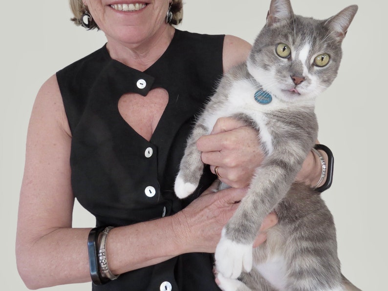 Linen Summer top with Heart Shaped Keyhole Neckline and Pearl Buttons is available in Black or White. Cat not included.