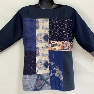 Unique Patchwork Shirt made from  Recycled Kimono fabrics with   Pure Linen and Cotton prints has  Boat neck and Three Quarter Sleeves. Back view