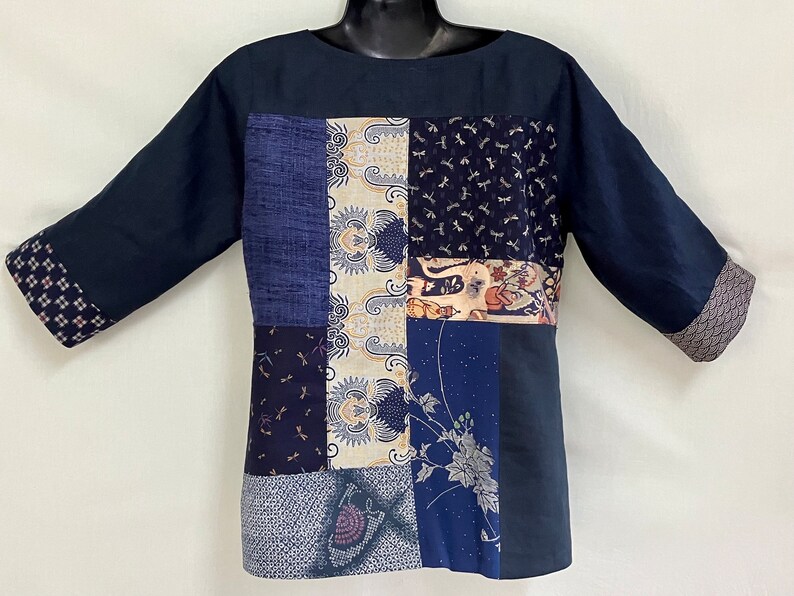 Unique Patchwork Shirt made from  Recycled Kimono fabrics with   Pure Linen and Cotton prints has  Boat neck and Three Quarter Sleeves. Back view