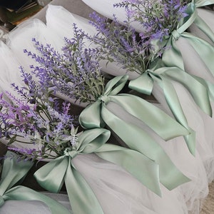 10 white tulle with sage ribbon and lavender flowers.