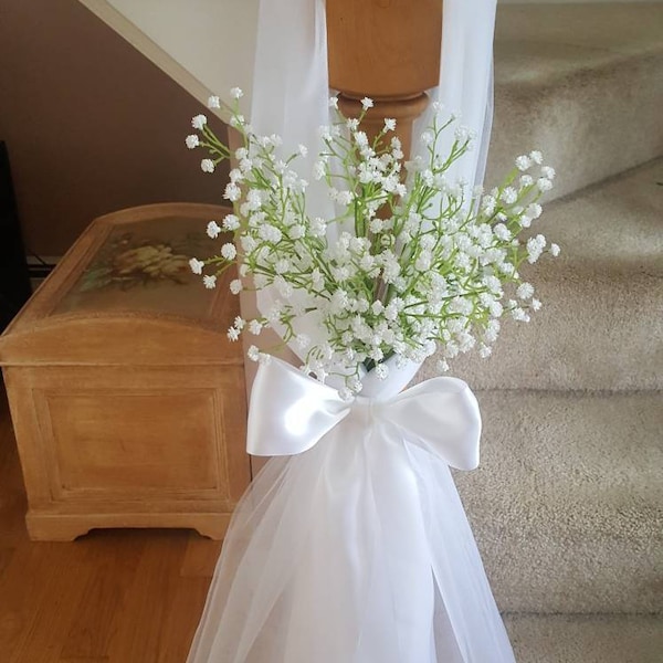 Set of 10 white tulle with babies breath pew hangers.