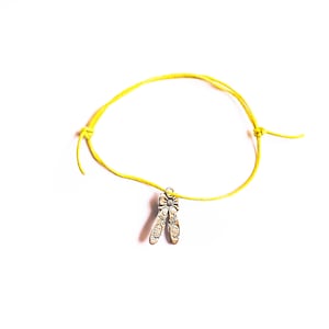 silver ballet shoes dancing charm on waxed cotton cord adjustable friendship bracelet