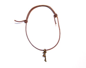 bronze fairy charm on waxed cotton cord adjustable friendship bracelet