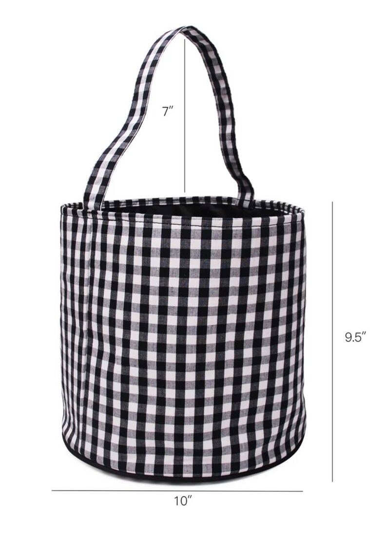 May include: Black and white checkered fabric bucket with a black handle. The bucket is 9.5 inches tall, 10 inches wide, and the handle is 7 inches long.