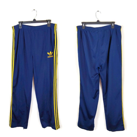 blue and yellow adidas pants