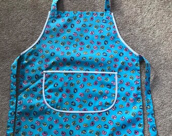Child's gift cooking craft fabric apron approx age 7-9  turquoise flowers