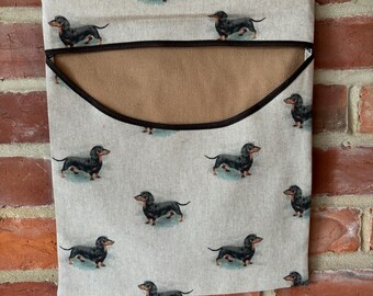 Strong country look peg bag beige sausage Dogs dachshund . Washing laundry
