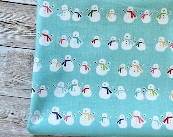 Blue snowman Christmas cotton fabric: winter scarves print