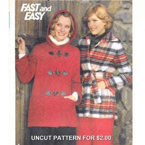 May include: A sewing pattern envelope titled FAST and EASY featuring two coats. One is a solid red hooded coat with three toggle closures. The other is a plaid coat in red, white, and black with a tie belt. The text reads UNCUT PATTERN FOR $2.00.