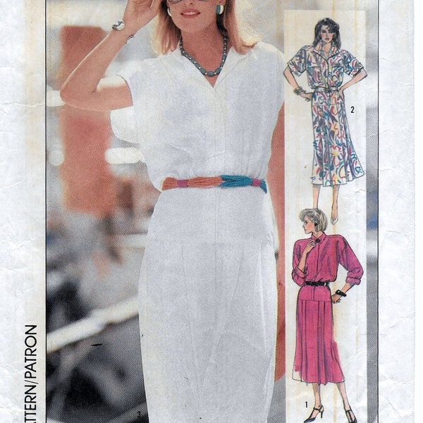 A Rolled/Cuffed Sleeve, Front Button Loose-Fit Bodice, Front Pleated Skirt Dress Pattern for Women: Size 10 Bust 32-1/2" • Simplicity 7509