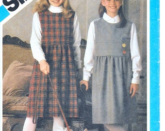 A Front Tucked Bodice, Back Zip, Gathered Skirt, Raised Waist Jumper Pattern for Girls: Size 12, Breast 30" • Simplicity 6601