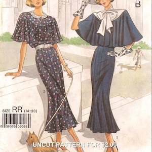 May include: A sewing pattern illustration featuring two dresses. One dress is dark blue with a small floral print, a white lace collar, and a belt. The other is a solid dark blue dress with a wide cape-style collar, a white neck tie, and polka dot gloves.