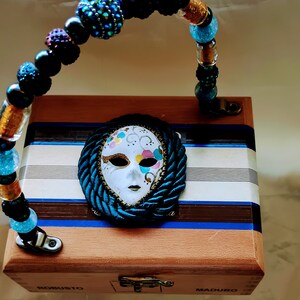 The Masquerade Blue Beaded Handle