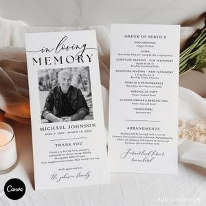 May include: A memorial service program with the text "in loving memory" and a photo of Michael Johnson. The program includes an order of service, thank you message, and arrangement details. The design is simple and elegant.