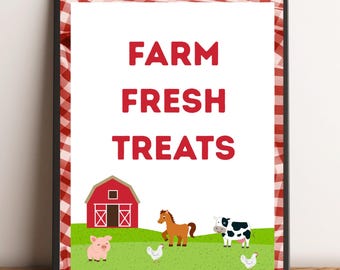 Op de afbeelding: Ingelijste print met een rood-witte geruite rand. De print toont de tekst "FARM FRESH TREATS" in het rood, boven een groen veld met een rode schuur, een varken, een paard, een koe en kippen.