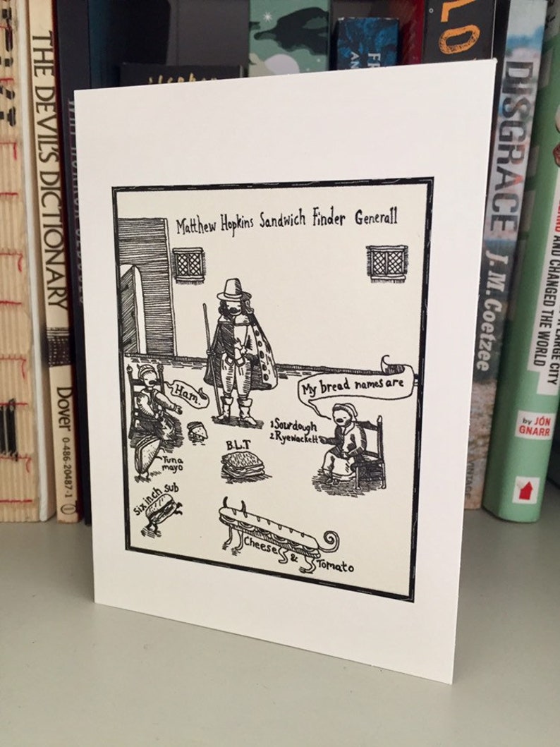 May include: A black and white illustration on a white card. The image features a figure labeled "Matthew Hopkins Sandwich Finder Generall" with sandwich options like "Ham", "BLT", and "Cheese & Tomato". The text "My bread names are" is also included.