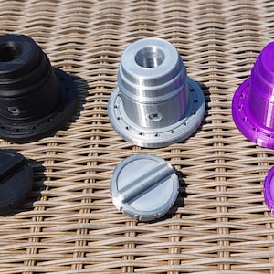Ghostbusters Frozen Empire, leg hose adapter. Magnetic/sew on.