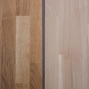 May include: Close-up of two wood samples, one with a natural finish and the other with an oiled finish. The wood is light brown and has a grain pattern. The text "Oiled finish" and "Natural finish" is written above each sample.