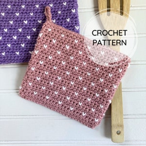 May include: Crochet pattern for a pink and white heart-shaped pot holder. The pot holder is made with a single crochet stitch and has a white heart design.