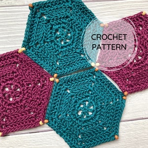 May include: Crochet pattern for a hexagon shaped granny square. The pattern is made up of teal and burgundy yarn. The text "CROCHET PATTERN" is written in white on a circle.