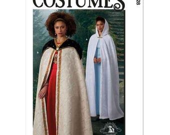 May include: McCall's Costumes sewing pattern M8428 for a hooded cape and a long, flowing cape with a high collar. The pattern includes instructions for making both capes.