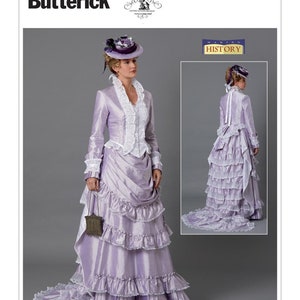 May include: A vintage sewing pattern for a long, lavender dress with a ruffled skirt and a matching jacket. The pattern is from Butterick and is part of their "Making History" collection. The pattern number is B6692.