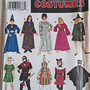 May include: Simplicity Costumes sewing pattern number 8285 for children's Halloween costumes. The pattern includes ten different costumes: a wizard, a witch, a princess, a fairy, a pirate, a clown, a mouse, a bat, a ghost, and a ballerina. The pattern is printed on white paper with black and red text.