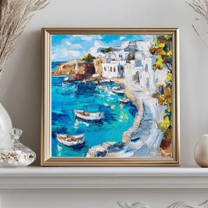 May include: A painting of a whitewashed village on a cliff overlooking a turquoise bay with boats in the water. The painting is framed in gold.