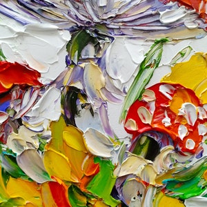 May include: A close-up of a painting depicting a cluster of colorful mushrooms with white, red, yellow, and green accents. The mushrooms are painted in a textured style, giving the impression of brushstrokes.