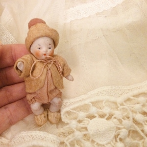 German Antique Bisque Hertwig Candy Baby Doll 2 3/4 Inches With Jammies and Booties
