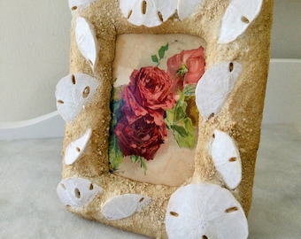 Seashell frame with rose postcard inside