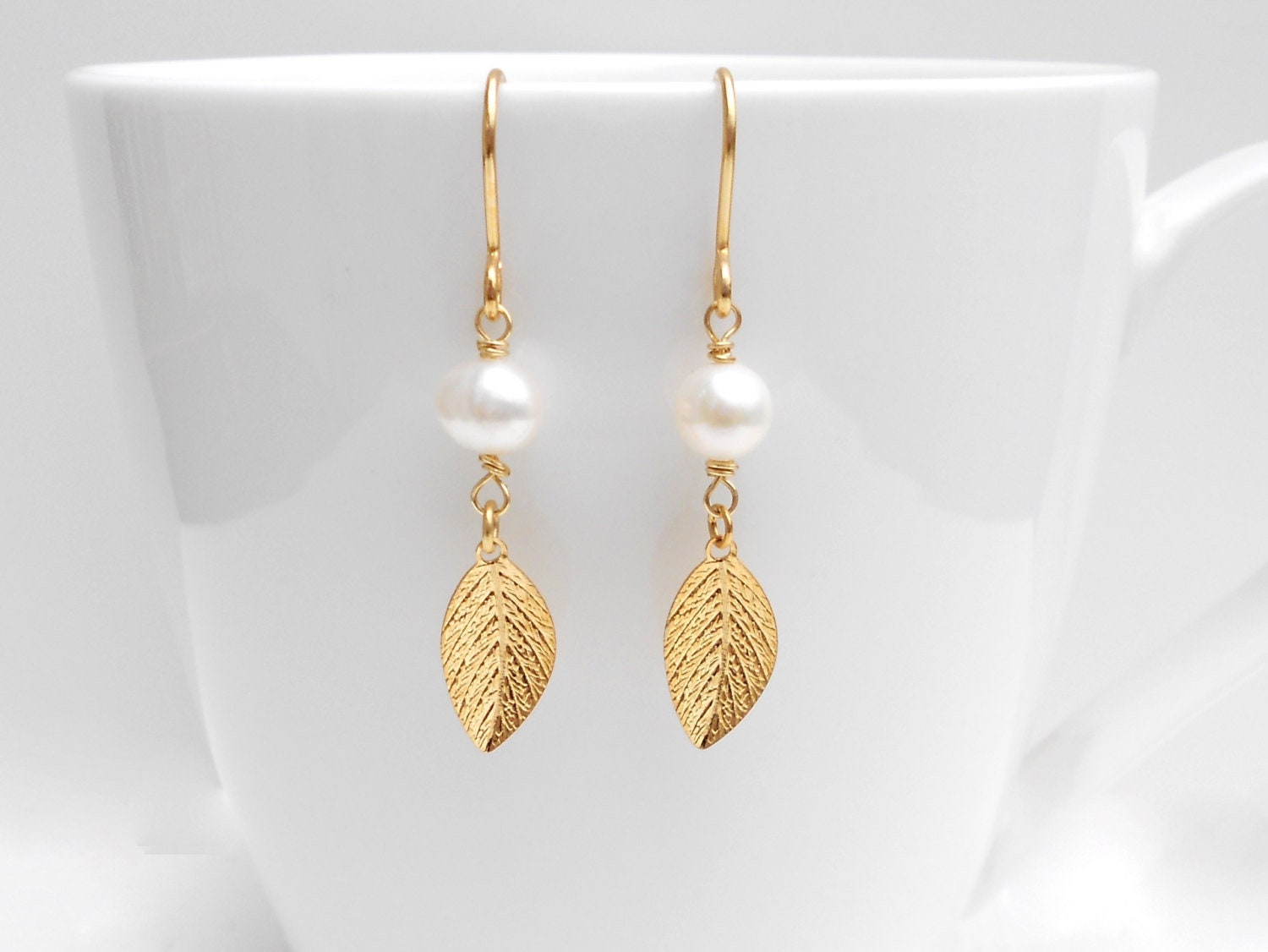 Yellow gold pearl earrings Gold leaf earrings June | Etsy
