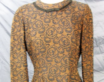 Beautifully fitting Brown & Black 1950's knit dress by designer Herbert Schneider