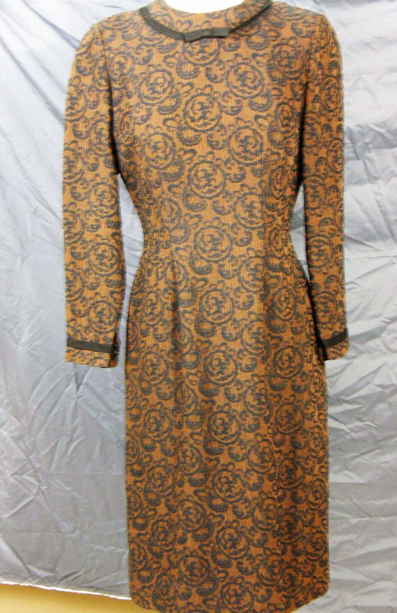 Beautifully fitting Brown & Black 1950's knit dress by designer Herbert Schneider