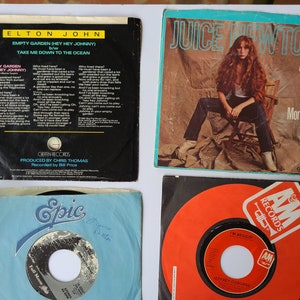 Vintage Soft Rock 80&#39;s Style 45 RPMs Elton John Juice Newton
