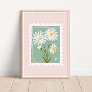 May include: A printable art print featuring a green stamp with white daisies and a pink background. The stamp says "April Daisy".