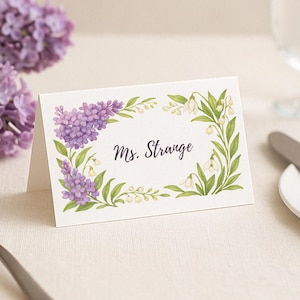 Tarjetas de lugar florales lilas editables - Tarjetas de mesa tipo carpa (PDF y plantilla de Canva) - Decoración para bodas de primavera, brunch, baby shower y el Día de la Madre
